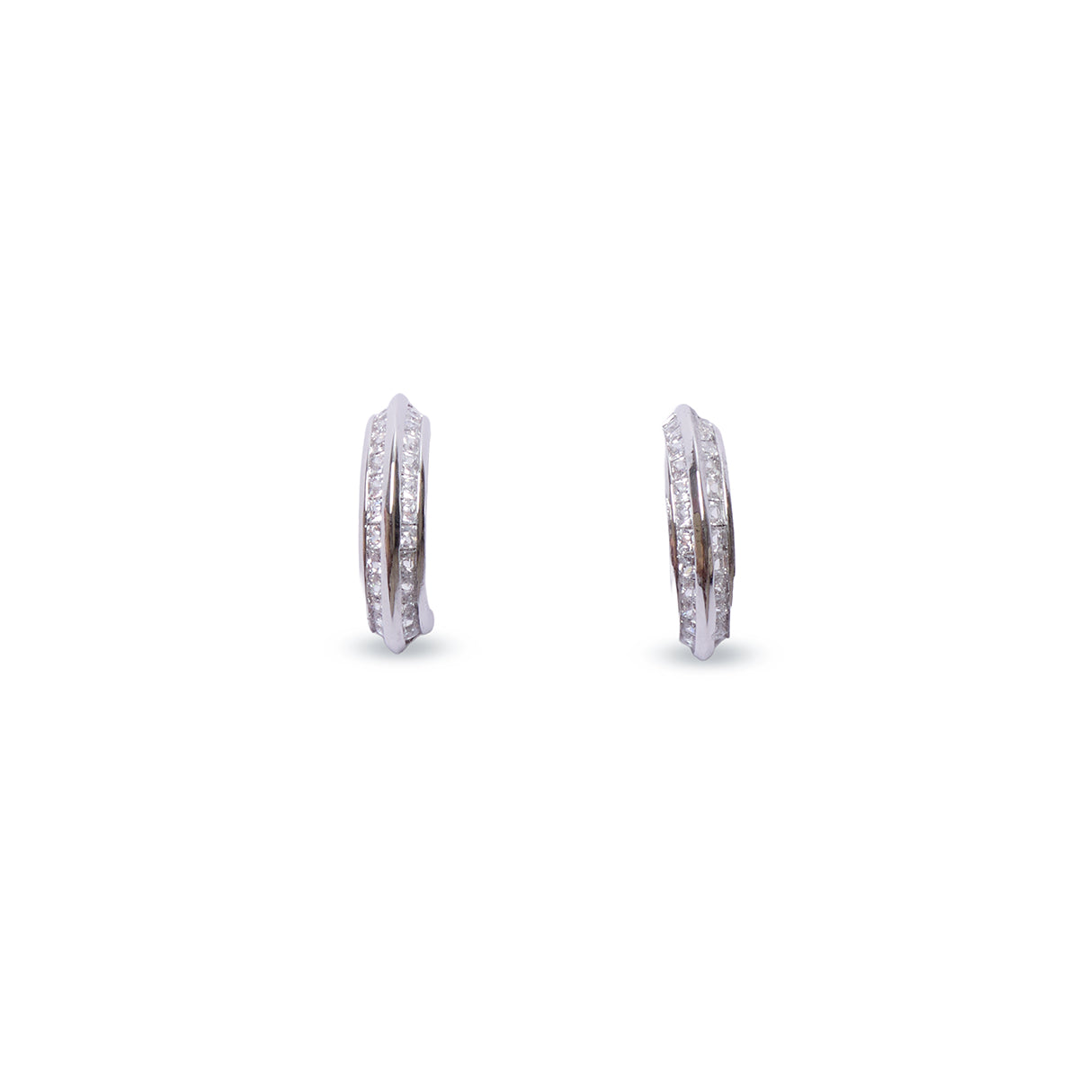 Angled view of Lumi hoop earrings showing clear stone detailing